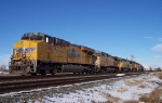 UP 7786 leads eastbound UP freight on to siding.